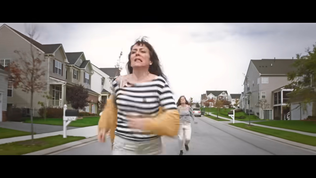 A still from Unedited Footage of a Bear where the main character is being chased by her doppelganger.