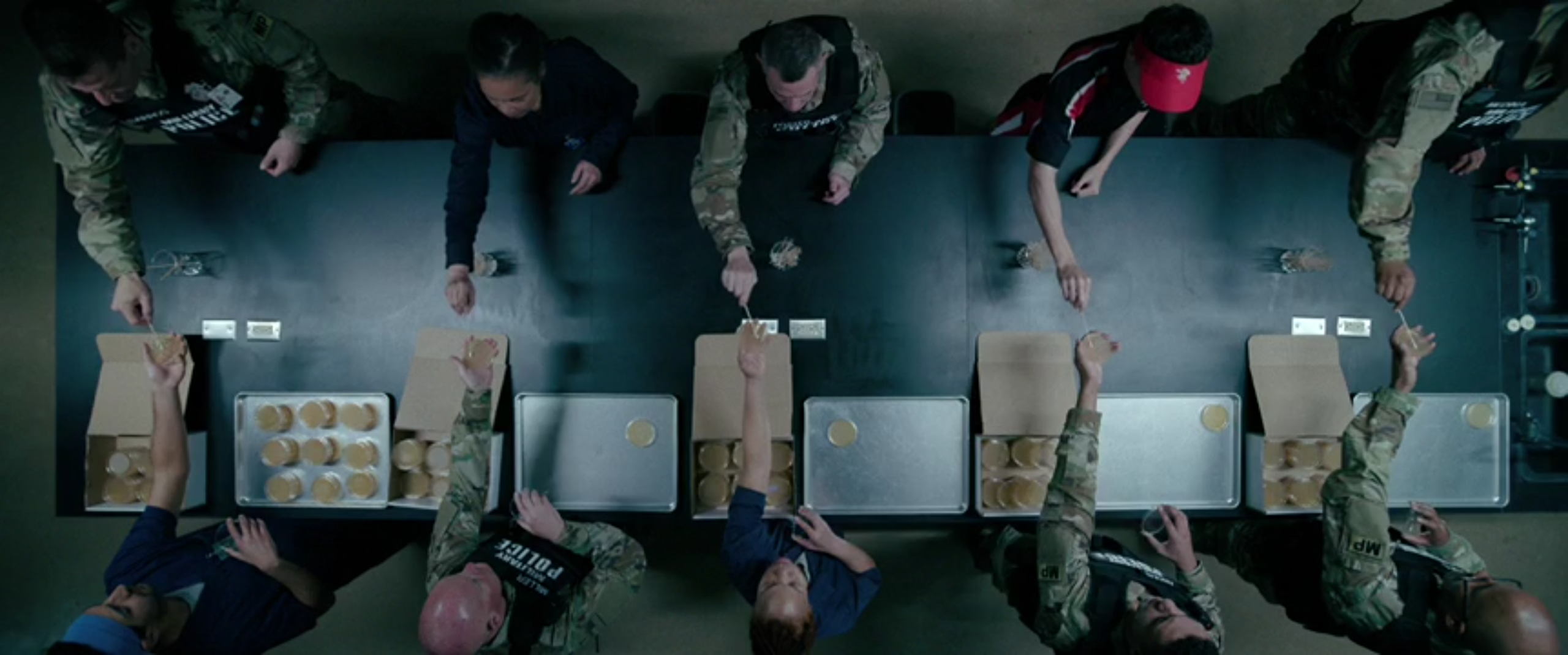 Ten early members of the Pluribus hivemind. They are licking cotton swabs and wiping them on petri dishes.