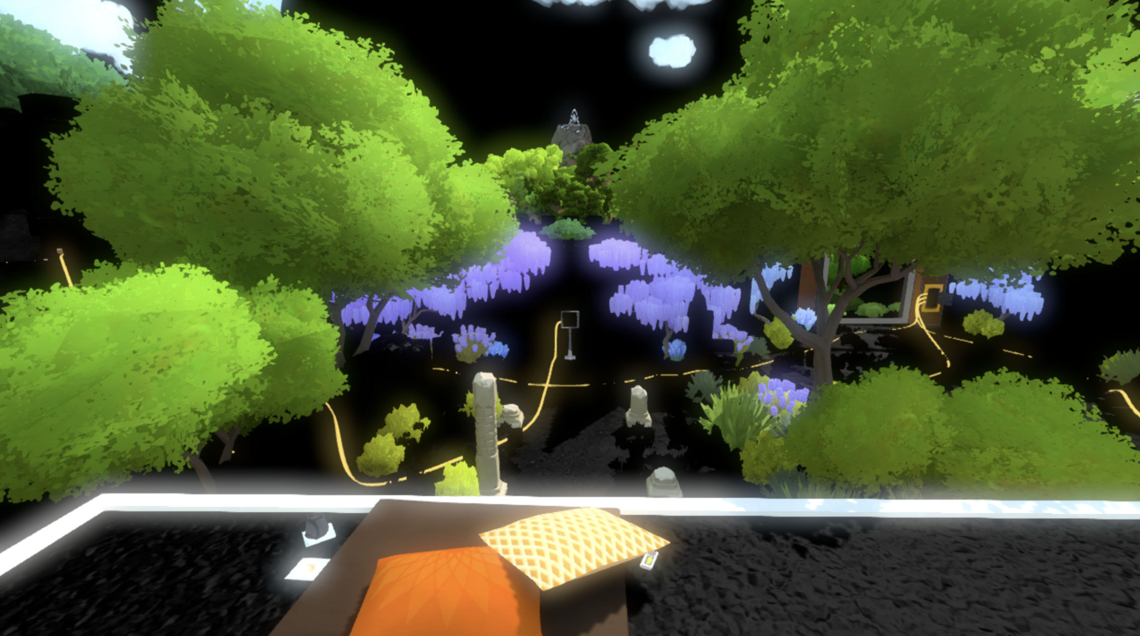 A view of the Tutorial area in The Witness, from atop the patio. It appears to be night time, and the floors and walls are black, but trees and other decorations are still colorful.